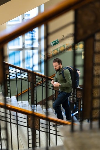 One man climbing the stairs