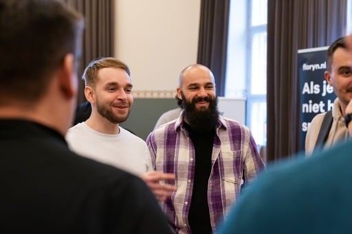 Photo of the Shopify stand shot through the crowd