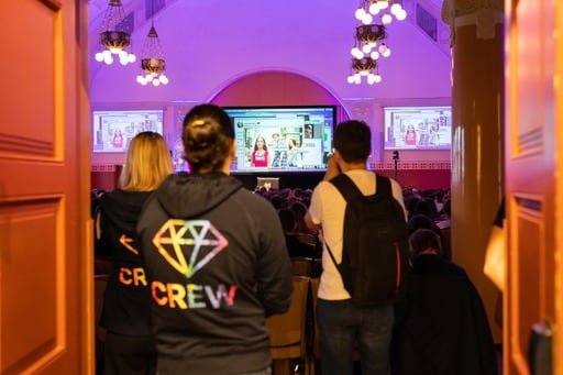 Some crew members watch Mel Kaulfuss