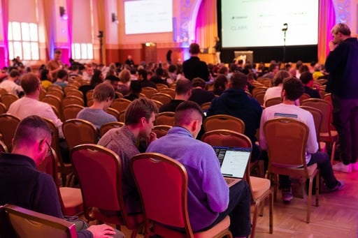 The audience waits for the next talk