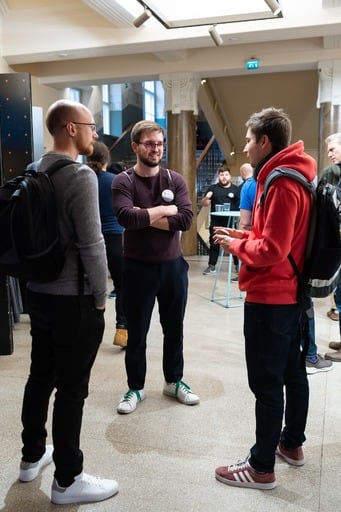 Group of three in the foyer